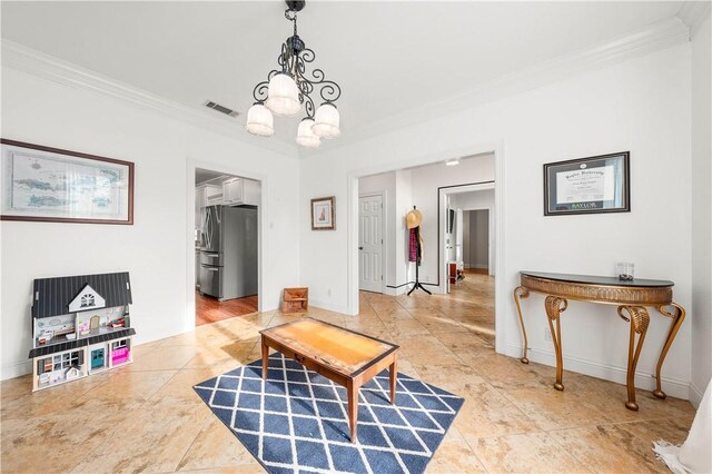 interior space featuring crown molding, a fireplace, and light hardwood / wood-style floors