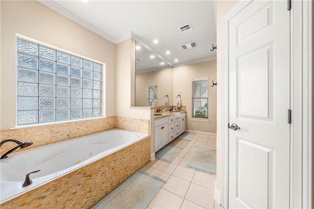 bathroom with tile patterned floors, tiled bath, crown molding, and vanity