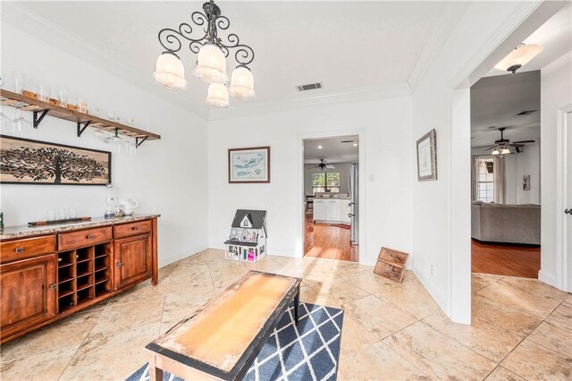 living room featuring light wood-type flooring, ceiling fan, and crown molding