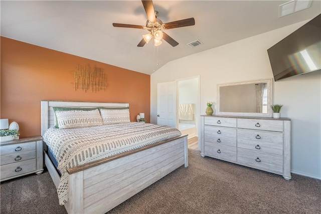 carpeted bedroom with lofted ceiling, connected bathroom, and ceiling fan