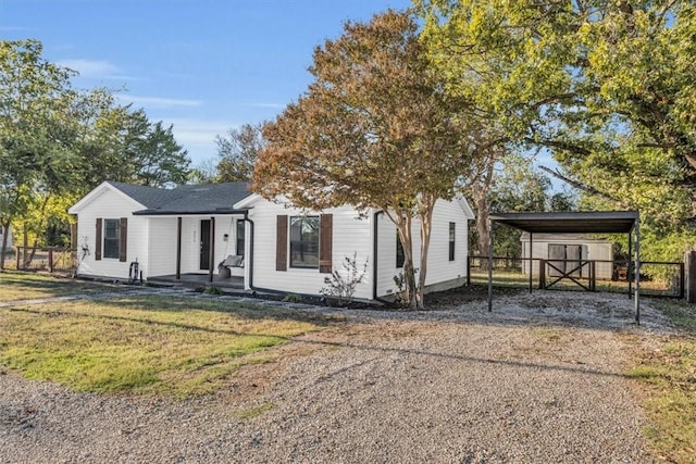 view of front of home with a carport