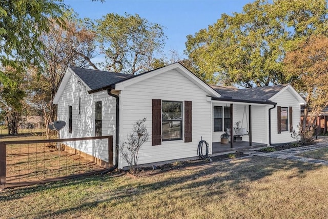 exterior space with a front lawn