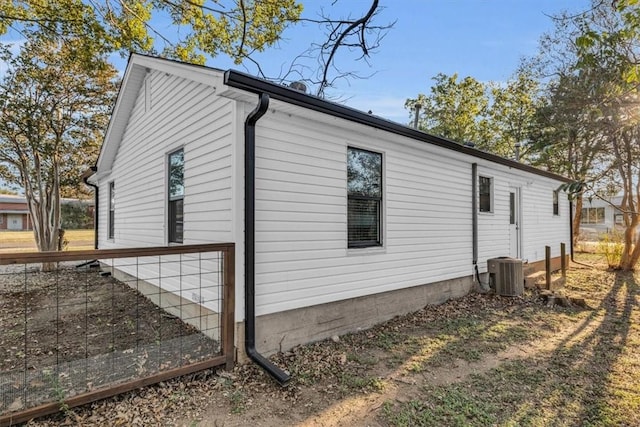 view of property exterior with cooling unit