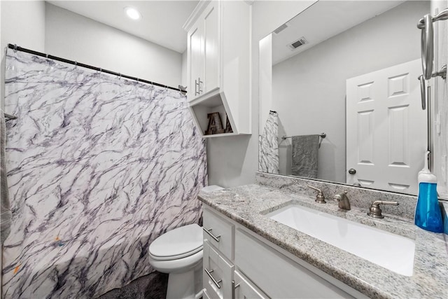 full bathroom featuring vanity, toilet, and shower / bath combo