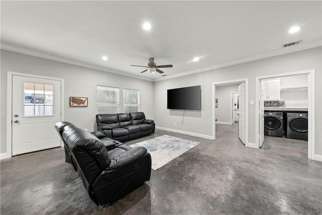 living room with ornamental molding, washer and dryer, and ceiling fan