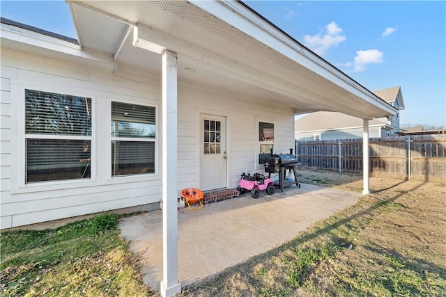 doorway to property with a patio area