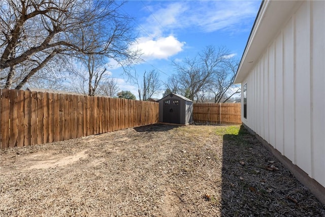 view of yard with a storage shed