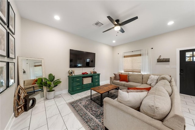 living room featuring ceiling fan