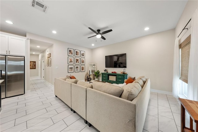 living room with ceiling fan