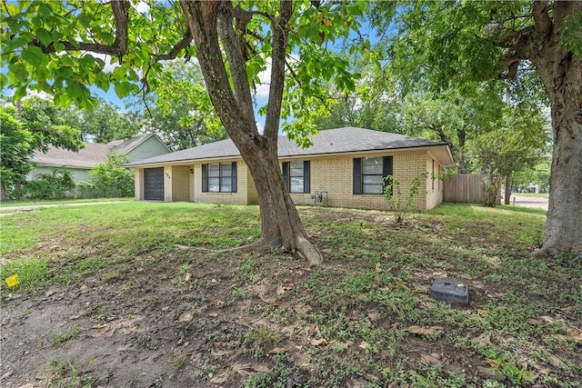 ranch-style home with a garage