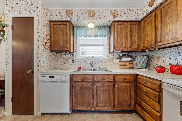 kitchen with sink and white appliances