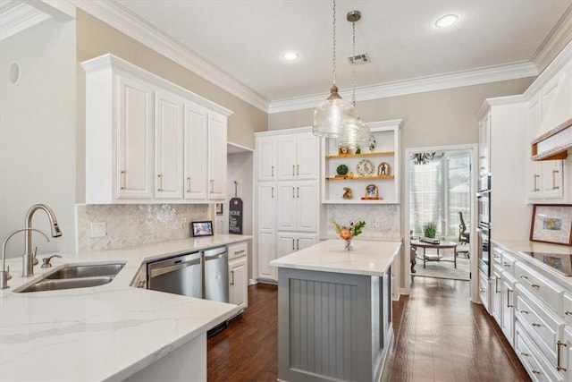 kitchen featuring a sink, white cabinetry, appliances with stainless steel finishes, dark wood-style floors, and open shelves