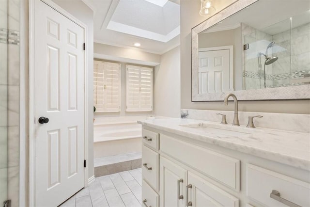 bathroom featuring a garden tub, crown molding, a shower stall, vanity, and tile patterned flooring