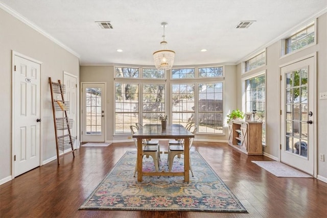 interior space featuring visible vents and an inviting chandelier