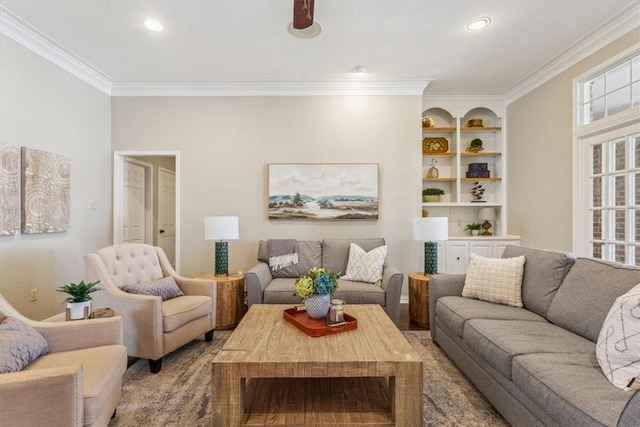 living area with a healthy amount of sunlight, recessed lighting, and crown molding