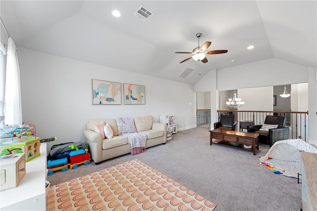 carpeted living room featuring ceiling fan with notable chandelier and lofted ceiling