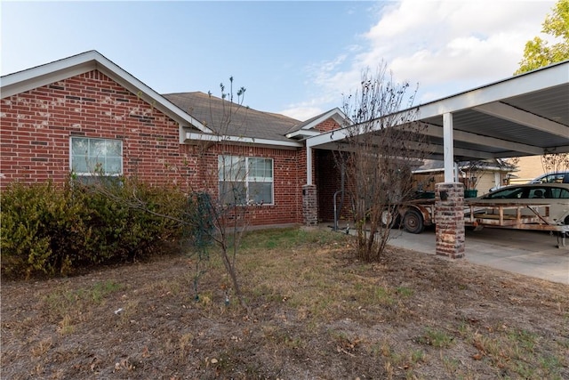 view of property exterior featuring a carport