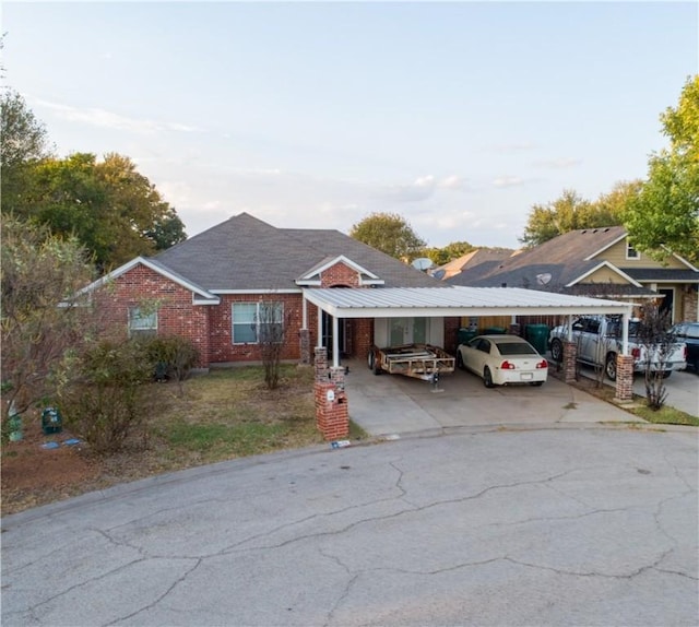 view of front of home with a carport