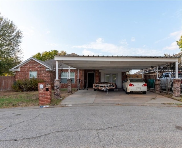 view of front of property with a carport