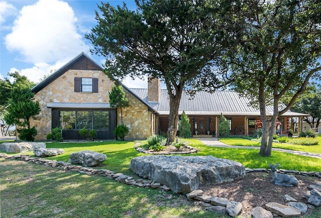 view of front of home with a front lawn