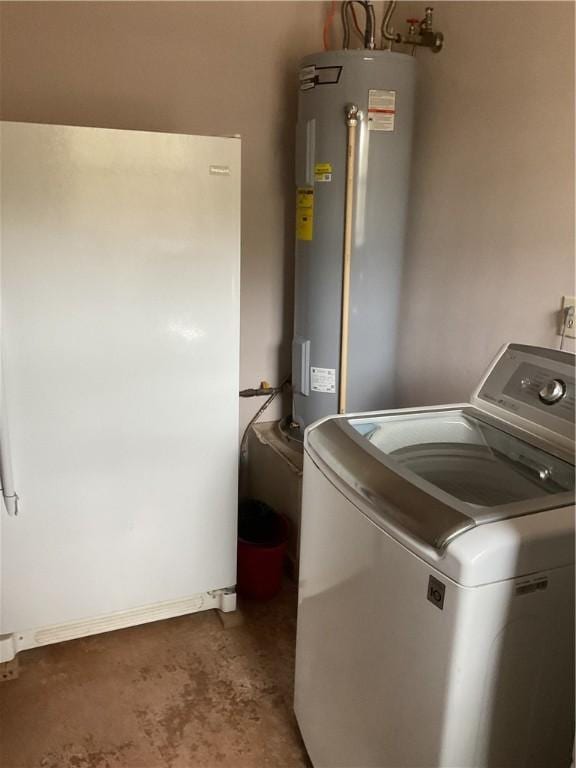 laundry room with electric water heater, washer / clothes dryer, and dark carpet