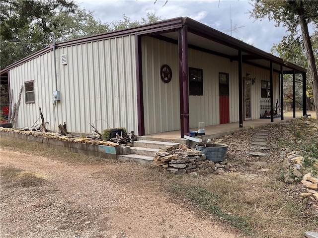 view of outbuilding featuring a porch