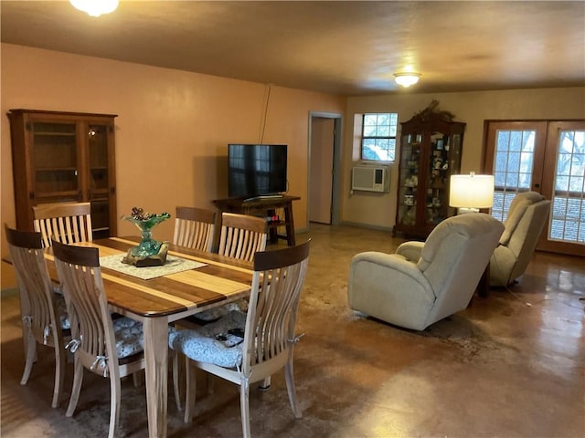 dining area featuring plenty of natural light and french doors