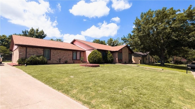 ranch-style house with a front yard