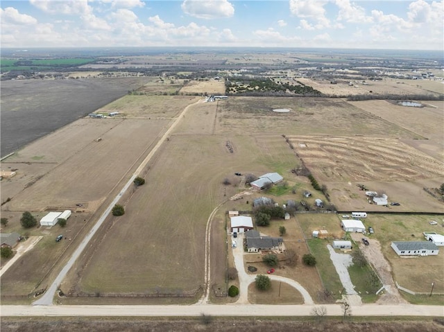 birds eye view of property featuring a rural view