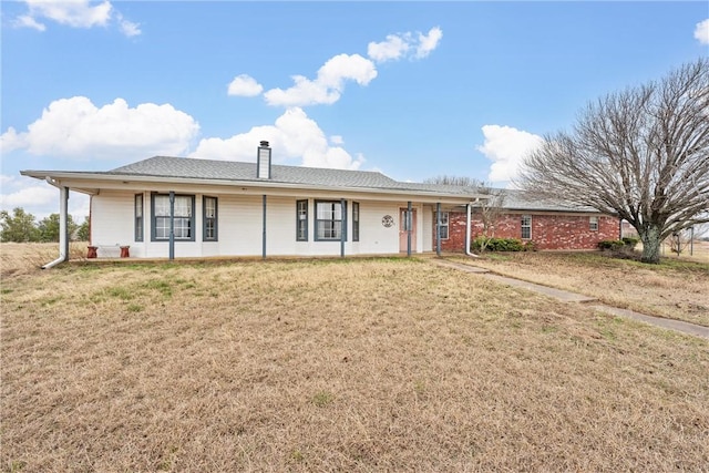 view of front of home with a front yard