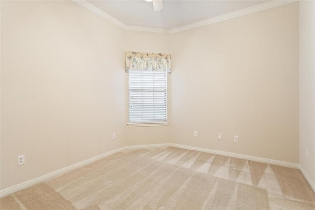 empty room with light carpet, ceiling fan, and ornamental molding