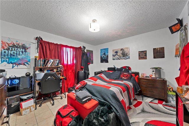 tiled bedroom with a textured ceiling