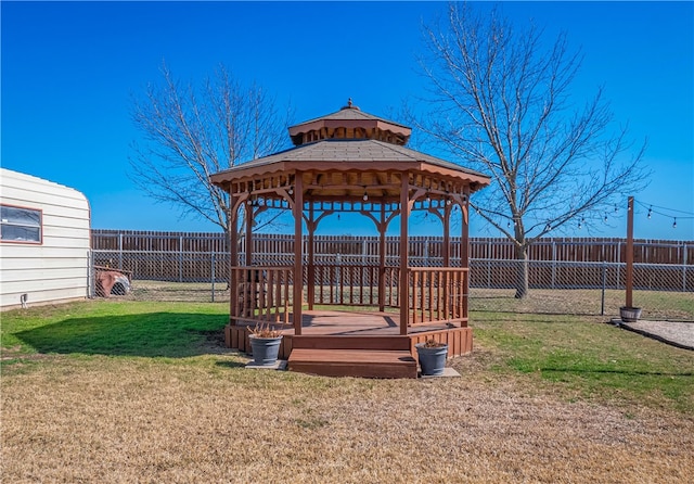 view of yard with a gazebo and a deck