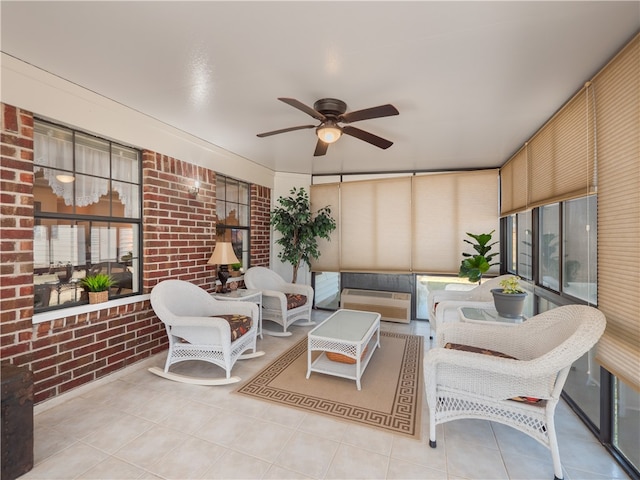 interior space with ceiling fan