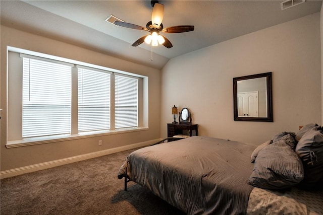 carpeted bedroom with ceiling fan and lofted ceiling