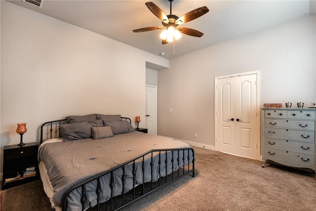 bedroom featuring ceiling fan, a closet, and carpet