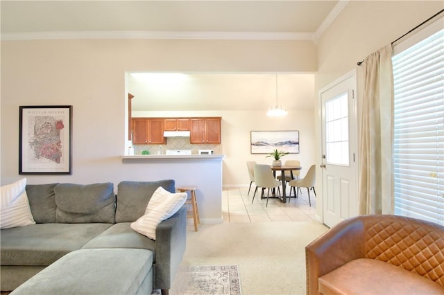 living room featuring light carpet, crown molding, and a notable chandelier