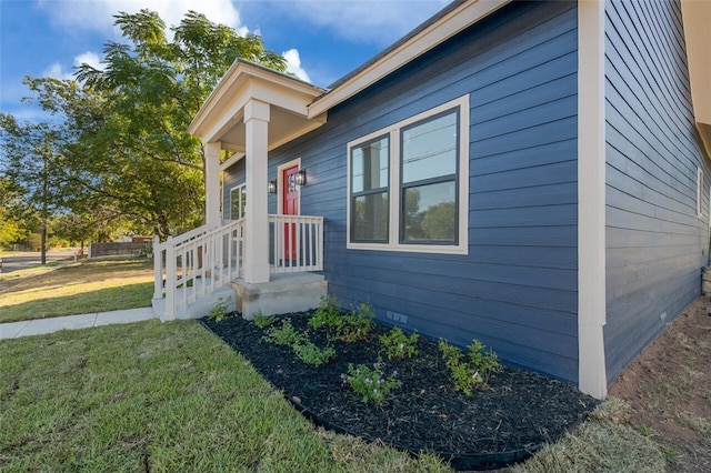 view of property exterior featuring a lawn