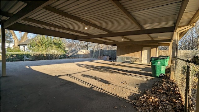 exterior space with a carport