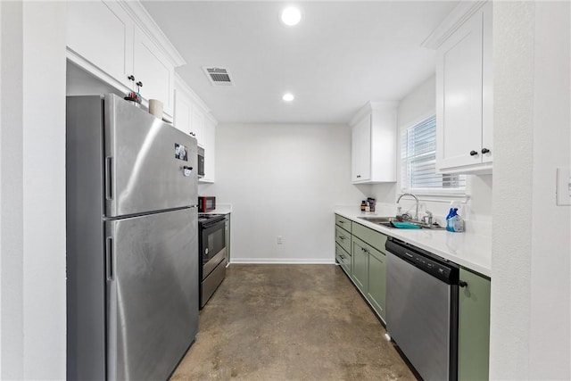 kitchen featuring green cabinets, white cabinetry, sink, and appliances with stainless steel finishes