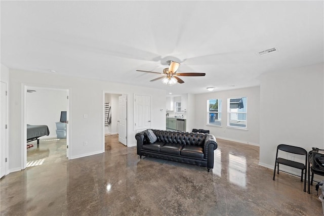 living room with concrete flooring and ceiling fan