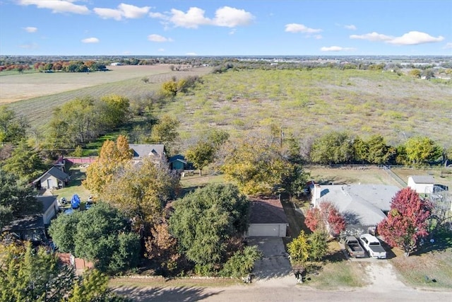 birds eye view of property featuring a rural view