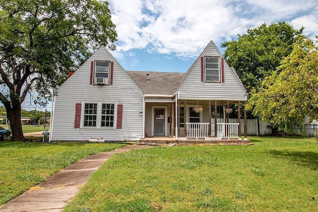 view of front facade with covered porch and a front yard