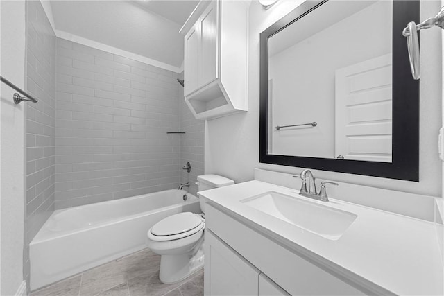 full bathroom with vanity, toilet, crown molding, and tiled shower / bath combo