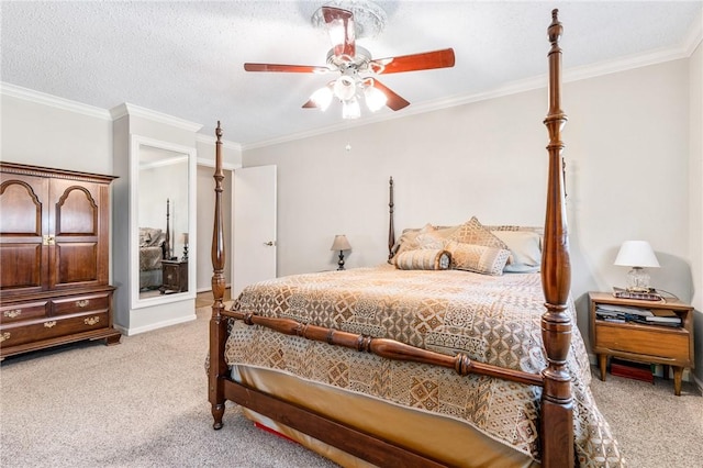 carpeted bedroom featuring a textured ceiling, ceiling fan, and ornamental molding