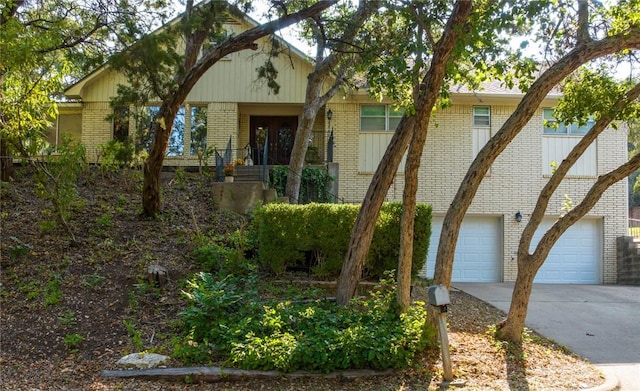 view of front of property with a garage