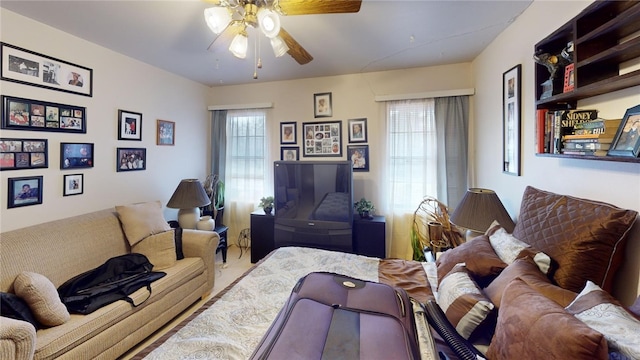 interior space with ceiling fan and a healthy amount of sunlight