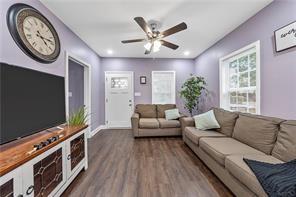 living room featuring dark hardwood / wood-style floors