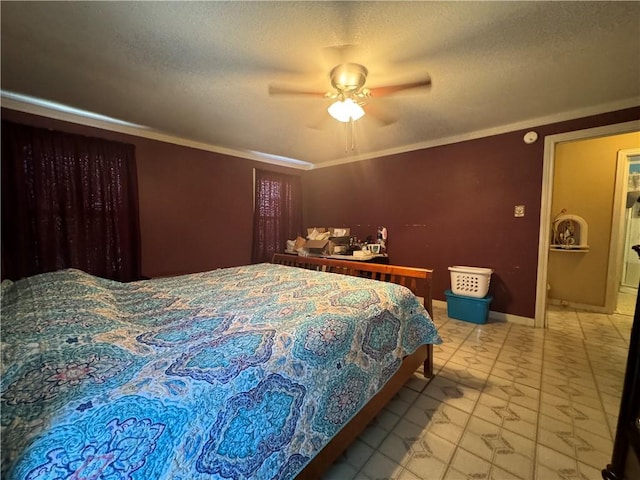 bedroom featuring a textured ceiling, ceiling fan, and crown molding