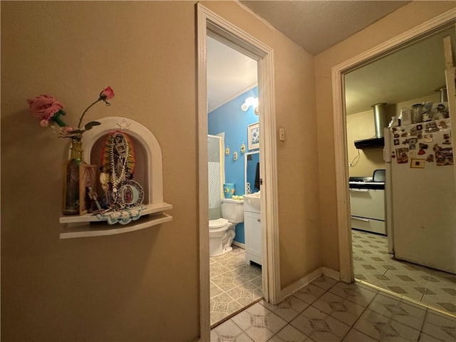 hallway with light tile patterned floors